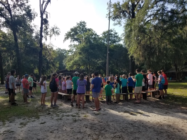 Campers gathered for outdoor group assembly