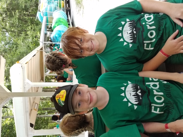Two smiling kids in Florida Bible Camp shirts
