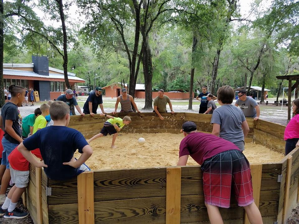 Campers and staff playing gaga ball